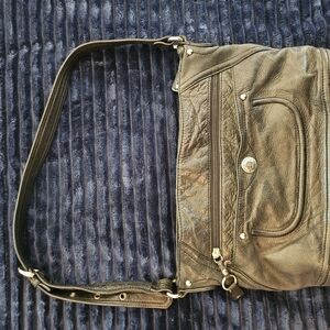 Stone Mountain black leather shoulder bag with multiple pockets and zippers